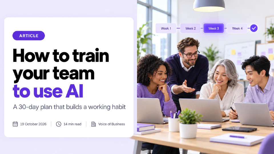 Cover for the article How to train your Team to use AI. Four colleagues smile around a bright office table with laptops while a manager explains something, under a row of four week blocks with a purple checkmark. The headline sits on a white card with the subtitle A 30-day plan that builds a working habit, and a line reading 19 October 2026, 14 min read, Voice of Business.