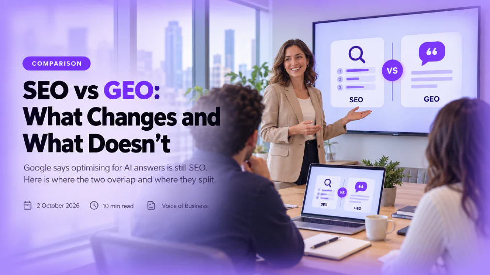 Cover for the review SEO vs GEO: What Changes and What Doesn't. A presenter in a beige blazer gestures at a wall screen showing two comparison cards, SEO with a magnifier and ranked results, GEO with a quote bubble, while two colleagues watch and a laptop on the table shows the same comparison.